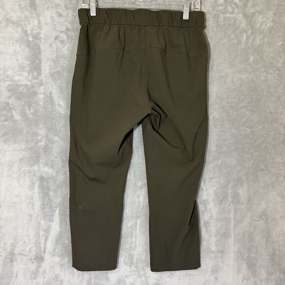 Lululemon On The Fly Crop Cropped Dark Olive Pants Women Size 6 Stretch Travel - Picture 3 of 8